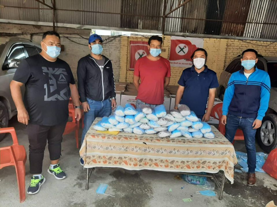 नेविसंघ र तरुण दल सहयोगी अभियानमा, काठमाडौंमा वितरण गर्दै लाखौं थान माक्स